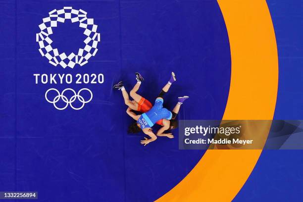 Evelina Georgieva Nikolova of Team Bulgaria competes against Anastasia Nichita of Team Moldova during the Women's Freestyle 57kg Quarter Final on day...