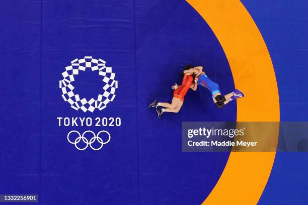 Evelina Georgieva Nikolova of Team Bulgaria competes against Anastasia Nichita of Team Moldova during the Women's Freestyle 57kg Quarter Final on day...