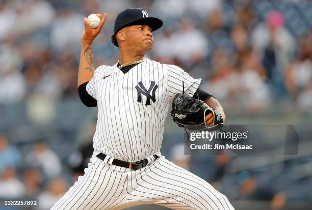 Luis Gil of the New York Yankees in action against the Baltimore Orioles during his major league debut at Yankee Stadium on August 03, 2021 in New...