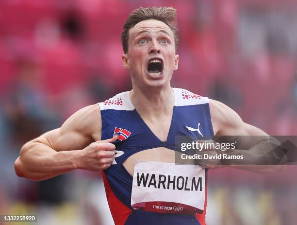 Karsten Warholm of Team Norway reacts after winning the gold medal in the Men's 400m Hurdles Final on day eleven of the Tokyo 2020 Olympic Games at...