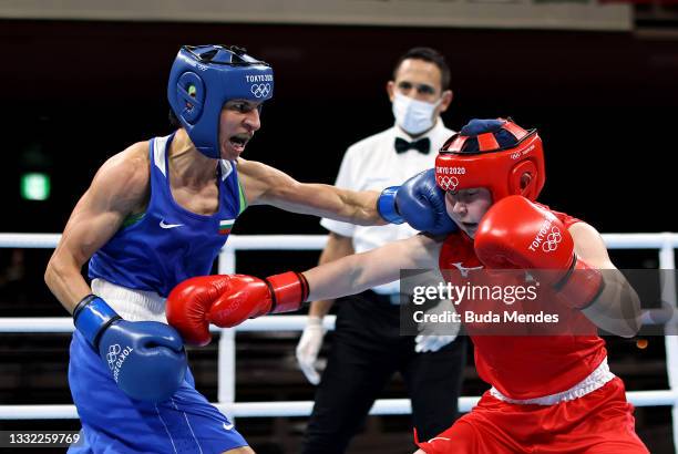 Tsukimi Namik of Team Japan exchanges punches with Stoyka Zhelyazkova Krasteva of Team Bulgaria during the Women's Fly semi final on day twelve of...