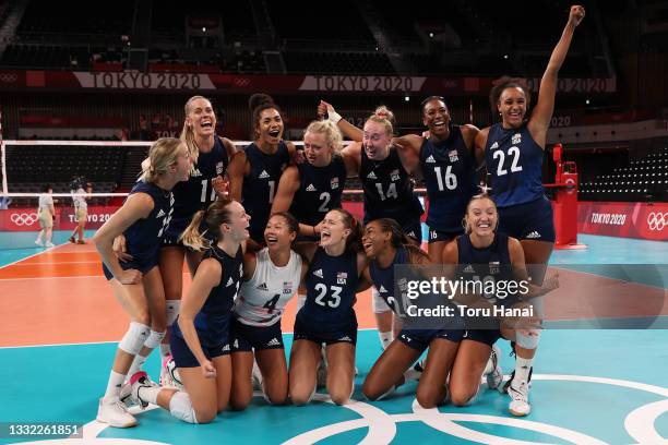 Team United States poses for a photo after defeating Team Dominican Republic during the Women's Quarterfinals volleyball on day twelve of the Tokyo...