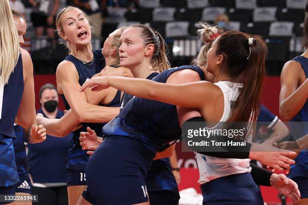 Kimberly Hill of Team United States celebrates with teammates after defeating \DOM\ during the Women's Quarterfinals volleyball on day twelve of the...