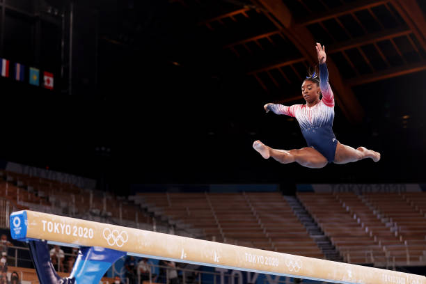 Simone Biles of Team United States competes in the Women's Balance Beam Final on day eleven of the Tokyo 2020 Olympic Games at Ariake Gymnastics...