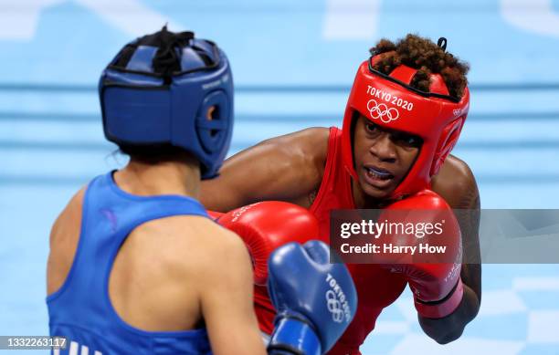 Oshae Jones of Team United States exchanges punches with Hong Gu of Team China during the Women's Welter semi final on day twelve of the Tokyo 2020...