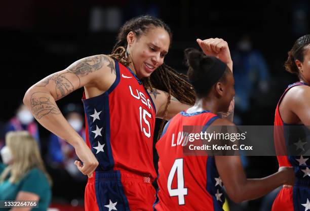 Brittney Griner and Jewell Loyd of Team United States celebrate a win against Team Australia during a Women's Basketball Quarterfinals game on day...