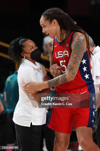 Brittney Griner and head coach Dawn Staley of Team United States celebrate a win against Team Australia during the second half of a Women's...