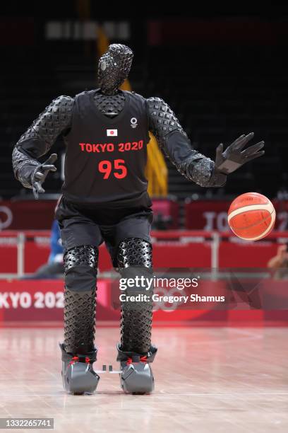 Robot plays basketball during halftima of a Women's Basketball Quarterfinals game between Team United States and Team Australia on day twelve of the...