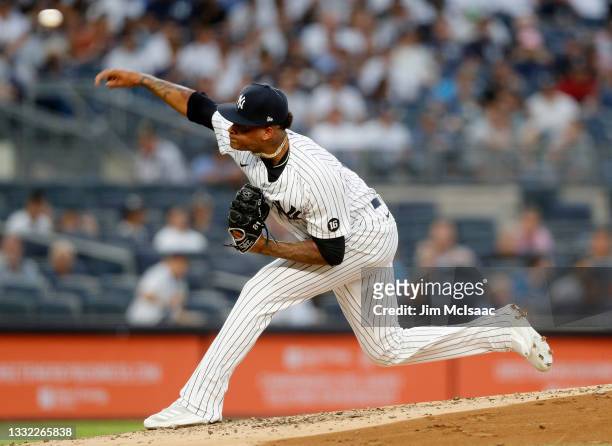 Luis Gil of the New York Yankees pitches during his major league debut against the Baltimore Orioles at Yankee Stadium on August 03, 2021 in New York...