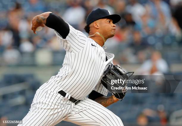 Luis Gil of the New York Yankees pitches during his major league debut against the Baltimore Orioles at Yankee Stadium on August 03, 2021 in New York...