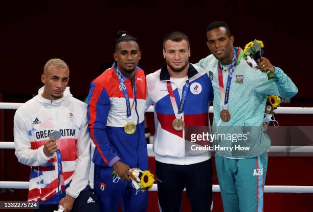 Men’s Light Heavy medalists Benjamin Whittaker of Team Great Britain , Arlen Lopez of Team Cuba , Imam Khataev of Team Russian Olympic Committee and...