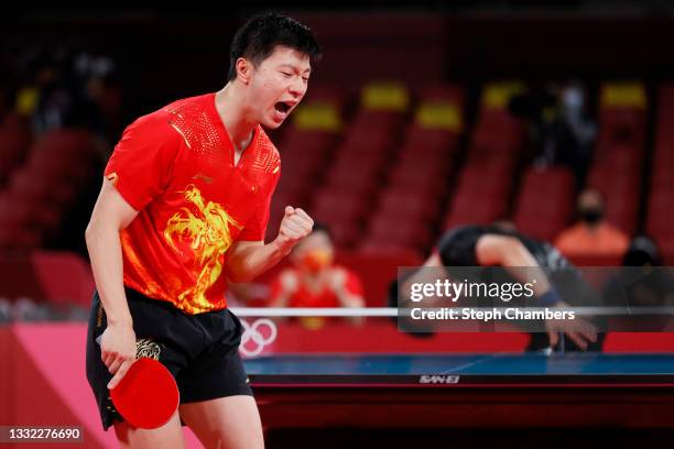 Ma Long of Team China reacts during his Men's Team Semifinals table tennis match on day twelve of the Tokyo 2020 Olympic Games at Tokyo Metropolitan...