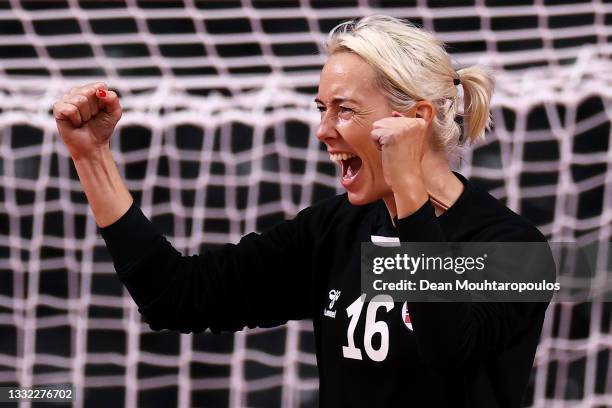 Katrine Lunde of Team Norway celebrates after making a late save during the Women's Quarterfinal handball match between Norway and Hungary on day...