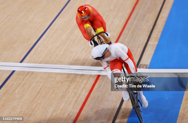 Patryk Rajkowski of Team Poland sprints to win ahead of Chao Xu of Team China during the Men's sprint round of 32 finals - heat 11 of the track...