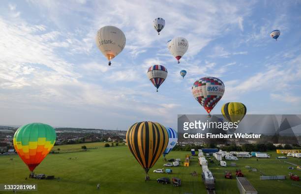 Hot air balloons take to the sky on August 04, 2021 in Bristol, England. "Fiesta Fortnight" takes place until Sunday 15th August 2021 with hundreds...