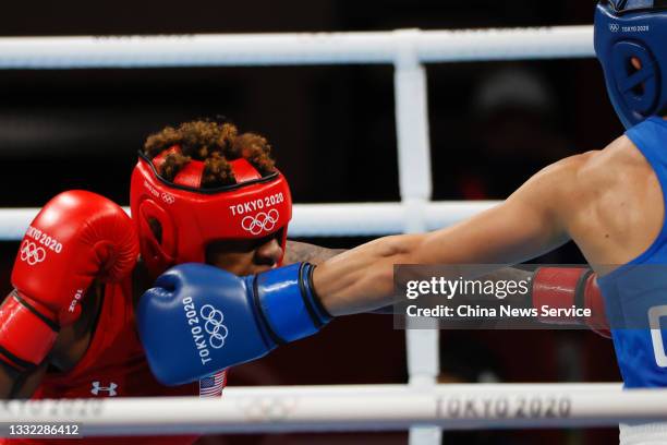 Oshae Jones of Team United States exchanges punches with Gu Hong of Team China during the Women's Welter Semifinal on day twelve of the Tokyo 2020...