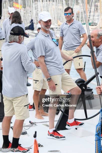 King Felipe VI of Spain on board a yacht during the 39th Copa Del Rey Mapfre Sailing Cup at Real Club Nautico on August 04, 2021 in Palma de...