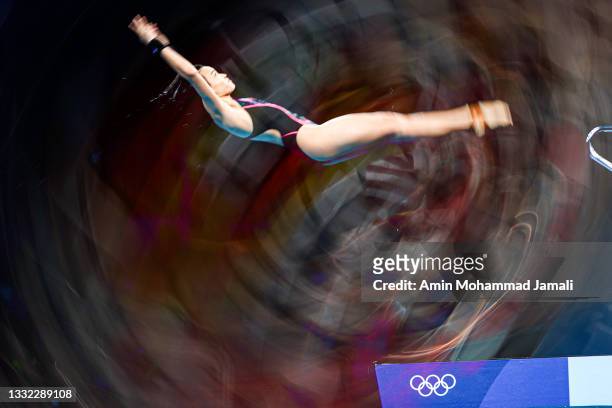Jun Hoong Cheong of Malaysia in action during the preliminary round of the women's 10 metre platform at the Tokyo Aquatics Centre on on day twelve of...