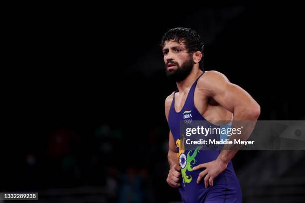 Kumar Ravi of Team India reacts after being defeated by Nurislam Sanayev of Team Kazakhstan during the Men’s Freestyle 57kg Semi Final on day twelve...