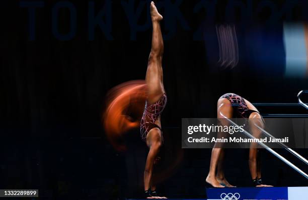 Jun Hoong Cheong of Malaysia in action during the preliminary round of the women's 10 metre platform at the Tokyo Aquatics Centreon day twelve of the...