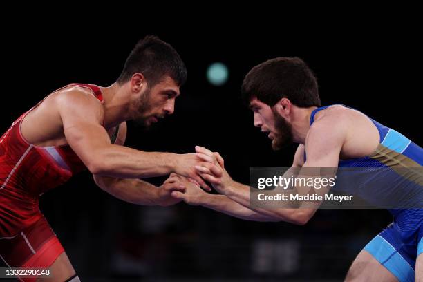 Reza Atrinagharchi of Team Islamic Republic of Iran competes against Zavur Uguev of Team ROC during the Men’s Freestyle 57kg Semi Final on day twelve...