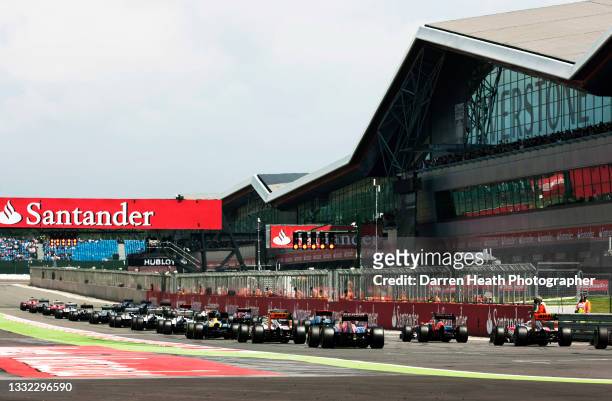 Sitting on pole position, Spanish Scuderia Ferrari Formula One driver Fernando Alonso and every Formula One car and racing driver on the start &...