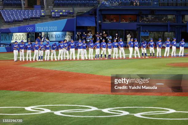 Team South Korea looks on during the national anthems prior to the game against Team Japan during the semifinals of men's baseball on day twelve of...