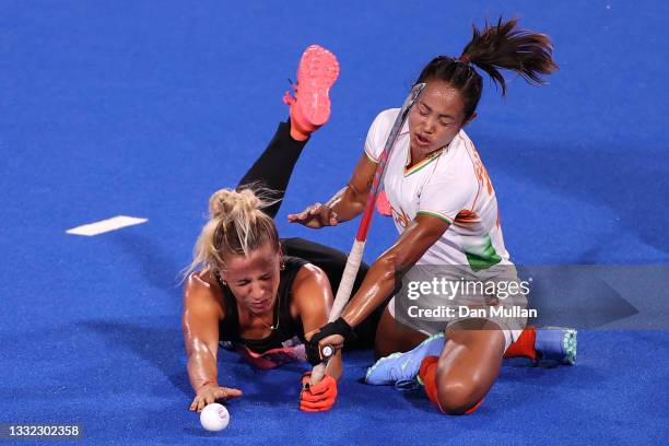 Julieta Jankunas of Team Argentina and Chanu Pukhrambam Sushila of Team India clash during the Women's Semifinal match between Argentina and India on...