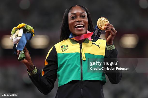 Elaine Thompson-Herah of Team Jamaica poses with the gold medal for the Women's 200m Final on day twelve of the Tokyo 2020 Olympic Games at Olympic...