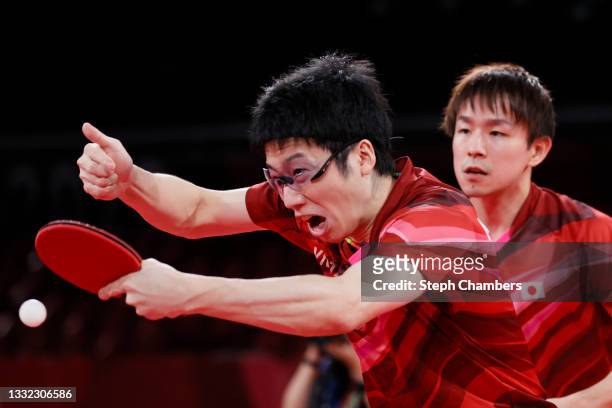 Mizutani Jun and Koki Niwa of Team Japan in action during their Men's Team Semifinals table tennis match on day twelve of the Tokyo 2020 Olympic...
