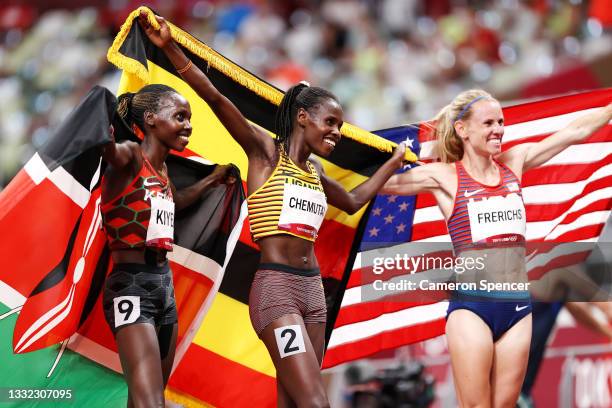 Bronze medal winner Hyvin Kiyeng of Team Kenya, gold medal winner Peruth Chemutai of Team Uganda and silver medal winner Courtney Frerichs of Team...