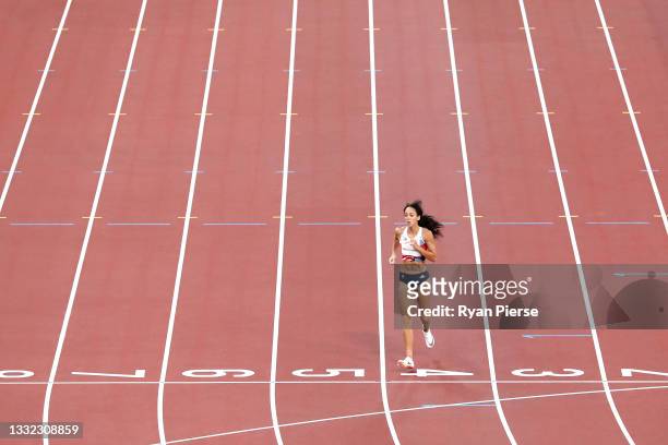 Katarina Johnson-Thompson of Team Great Britain limps across the finish line in the Women's Heptathlon 200m on day twelve of the Tokyo 2020 Olympic...