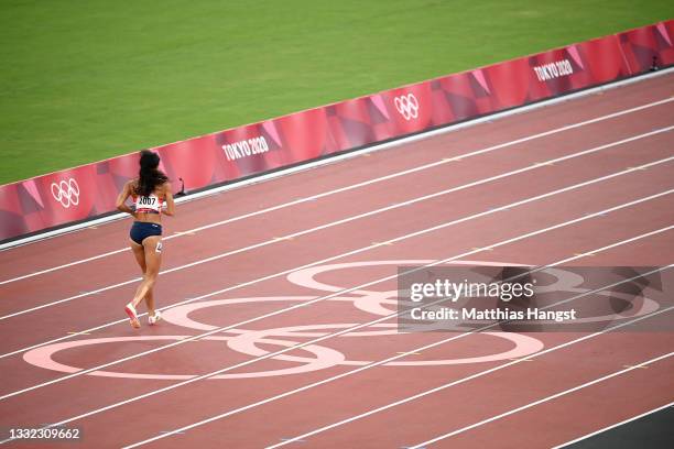 Katarina Johnson-Thompson of Team Great Britain limps towards the finish line in the Women's Heptathlon 200m on day twelve of the Tokyo 2020 Olympic...