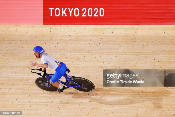 Simone Consonni of Team Italy celebrates winning a gold medal after setting a new World record during the Men's team pursuit finals, gold medal of...