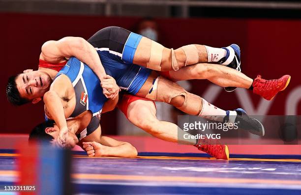 Deepak Punia of India competes against Lin Zushen of China during the Men's Freestyle 86kg 1/4 Final on day twelve of the Tokyo 2020 Olympic Games at...