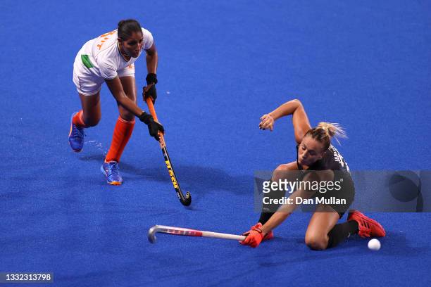 Gurjit Kaur of Team India and Julieta Jankunas of Team Argentina battle for the ball during the Women's Semifinal match between Argentina and India...