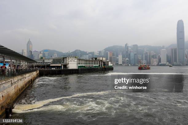 red tide at victoria harbour in hong kong - red_tide stock pictures, royalty-free photos & images