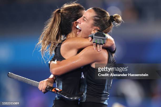 Agostina Alonso and Sofia Toccalino of Team Argentina celebrate victory in the Women's Semifinal match between Argentina and India on day twelve of...
