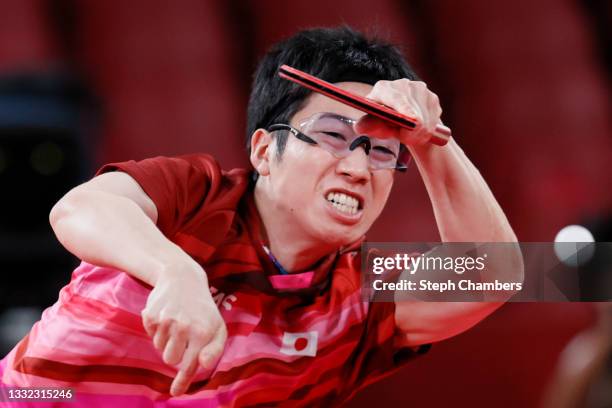 Mizutani Jun of Team Japan in action during his Men's Team Semifinals table tennis match on day twelve of the Tokyo 2020 Olympic Games at Tokyo...