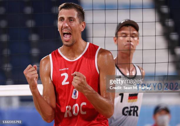 Oleg Stoyanovskiy of Team ROC reacts as he competes against Julius Thole of Team Germany during the Men's Quarterfinal beach volleyball on day twelve...