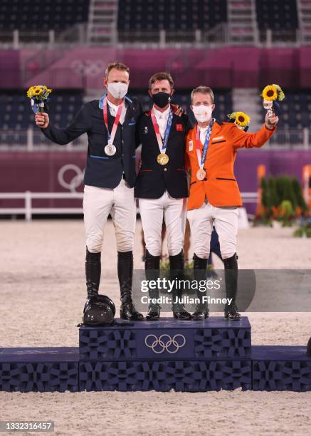 Silver medalist Peder Fredricson of Team Sweden , gold medalist Ben Maher of Team Great Britain and bronze medalist Maikel van der Vleuten of Team...