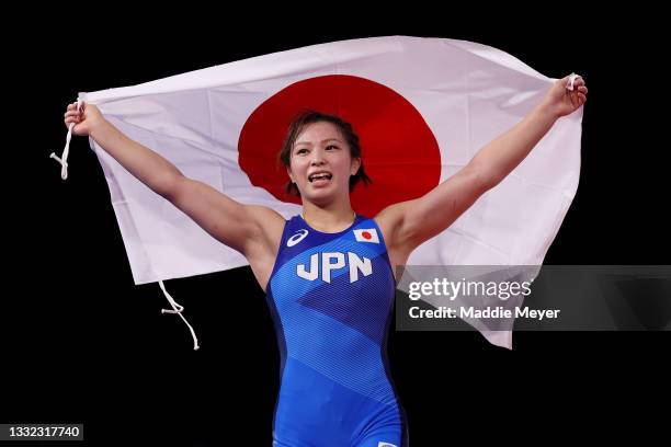 Yukako Kawai of Team Japan celebrates defeating Aisuluu Tynybekova of Team Kyrgyzstan during the Women’s Freestyle 62kg Gold Medal Match on day...