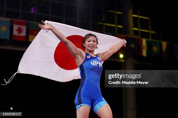 Yukako Kawai of Team Japan celebrates defeating Aisuluu Tynybekova of Team Kyrgyzstan during the Women’s Freestyle 62kg Gold Medal Match on day...