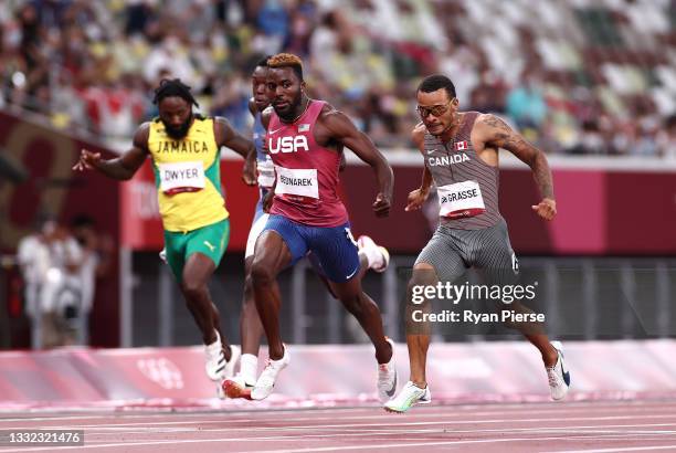 Andre de Grasse of Team Canada finishes ahead of Kenneth Bednarek of Team United States to win the gold medal in the Men's 200m Final on day twelve...