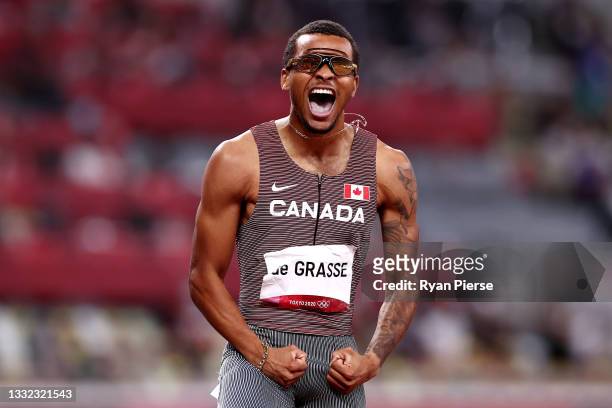 Andre de Grasse of Team Canada celebrates after winning the gold medal in the Men's 200m Final on day twelve of the Tokyo 2020 Olympic Games at...