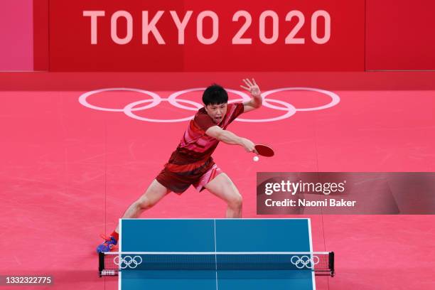 Harimoto Tomokazu of Team Japan reacts during his Men's Team Semifinals table tennis on day twelve of the Tokyo 2020 Olympic Games at Tokyo...