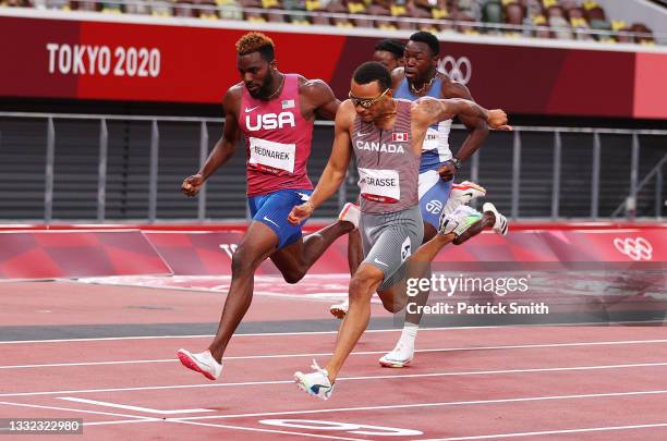 Andre de Grasse of Team Canada finishes ahead of Kenneth Bednarek of Team United States to win the gold medal in the Men's 200m Final on day twelve...