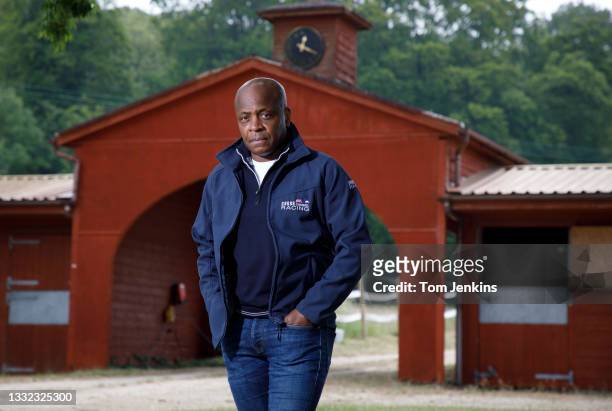 Paul Parker, the ex England footballer, who played for Fulham, QPR and Manchester United, poses for a portrait at the yard of racehorse trainer Robyn...