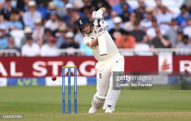 England batsman Joe Root drives during day one of the First Test Match between England and India at Trent Bridge on August 04, 2021 in Nottingham,...