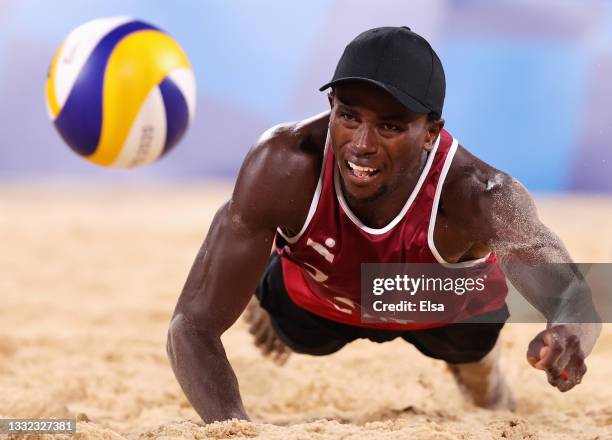 Ahmed Tijan of Team Qatar competes against Team Italy during the Men's Quarterfinal beach volleyball on day twelve of the Tokyo 2020 Olympic Games at...